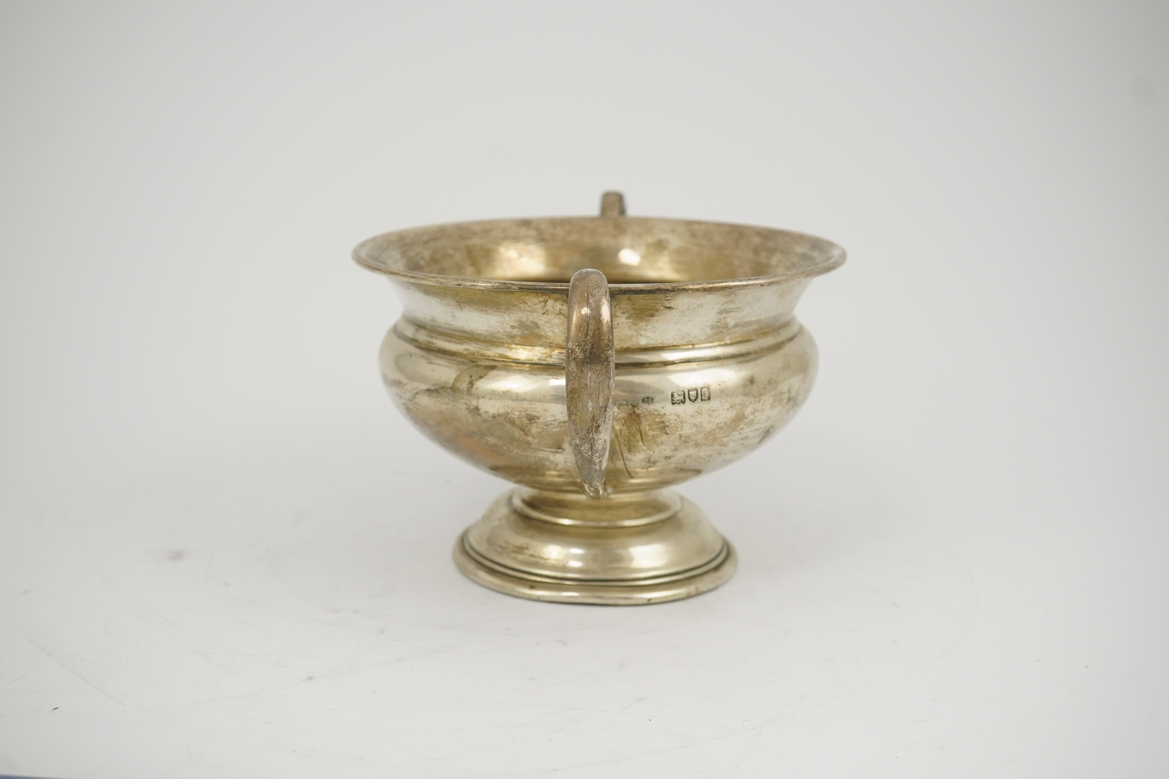 A George V silver two handled pedestal bowl, by Charles Edwards